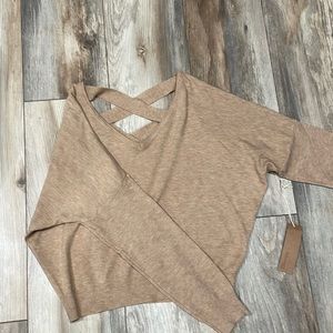 Cream sweater from Dry Goods. Size small.